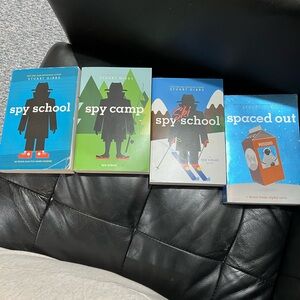 Lot of 4 Books by Stuart Gibbs Spy School, Spy Camp, spaced out ,Spy Ski
